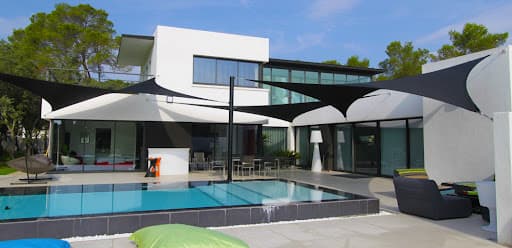 Outdoor setup with pool and shades, representing high-quality services